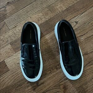 Tory Burch Glossy Black Slip-Ons with White Sole
